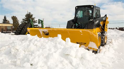 winged snow plow skid steer